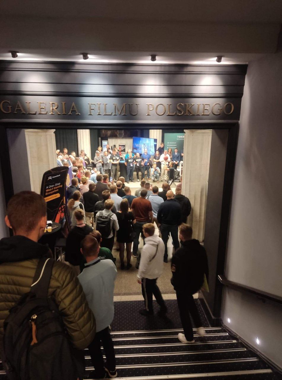 Crowd entering the CryptoVerse Expo venue at Galeria Filmu Polskiego